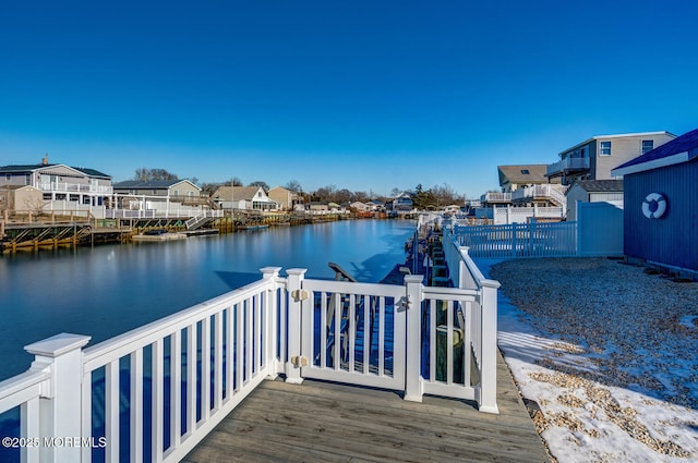 dock area featuring a water view