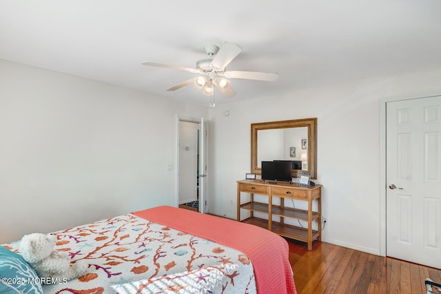 bedroom featuring wood-type flooring and ceiling fan