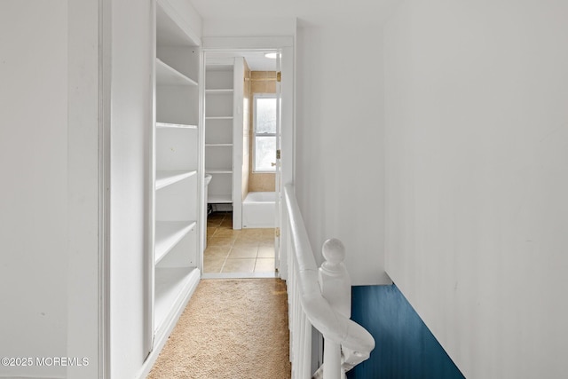 walk in closet featuring tile patterned flooring