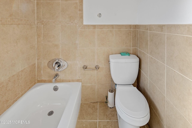 bathroom featuring toilet, tile walls, and a bathing tub