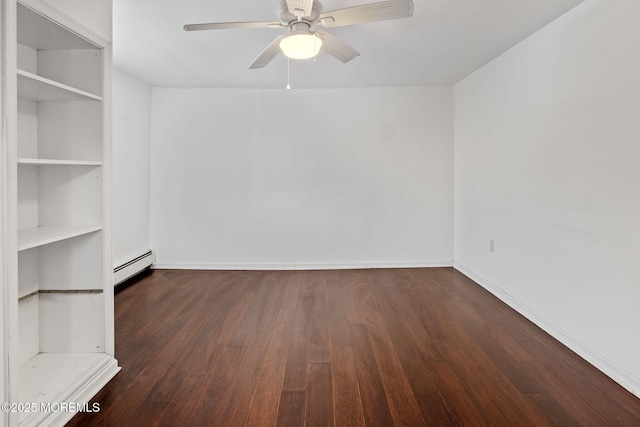 empty room with a baseboard heating unit, ceiling fan, and dark hardwood / wood-style floors