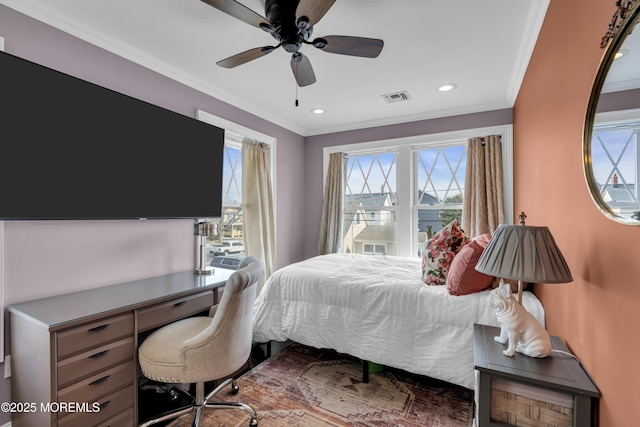 bedroom featuring ceiling fan and ornamental molding