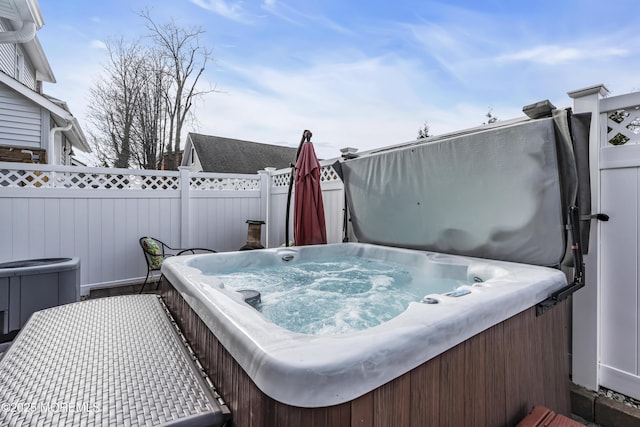 view of patio / terrace featuring a hot tub