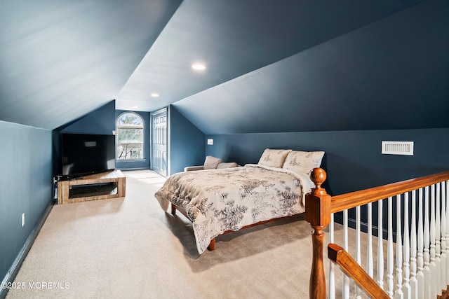 bedroom featuring vaulted ceiling, carpet, visible vents, and baseboards