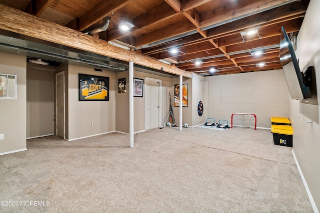 finished basement with carpet flooring