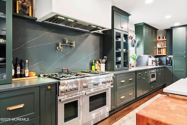 kitchen featuring range with two ovens, open shelves, light countertops, custom range hood, and backsplash