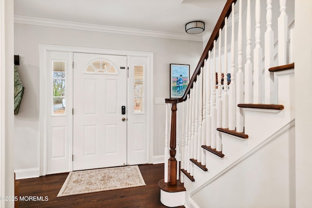 foyer with baseboards, stairway, dark wood finished floors, and crown molding