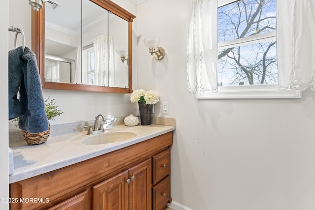 bathroom featuring vanity and crown molding