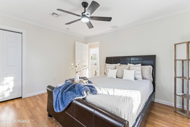 bedroom featuring ceiling fan, ornamental molding, and light hardwood / wood-style floors