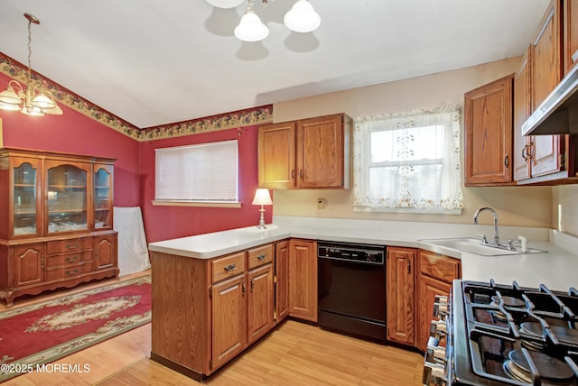 kitchen featuring sink, an inviting chandelier, dishwasher, and pendant lighting