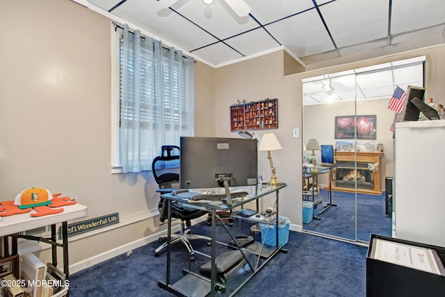 carpeted home office with ceiling fan