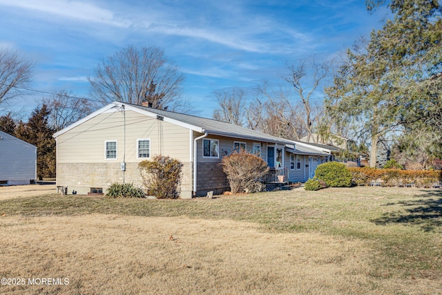 view of property exterior featuring a yard