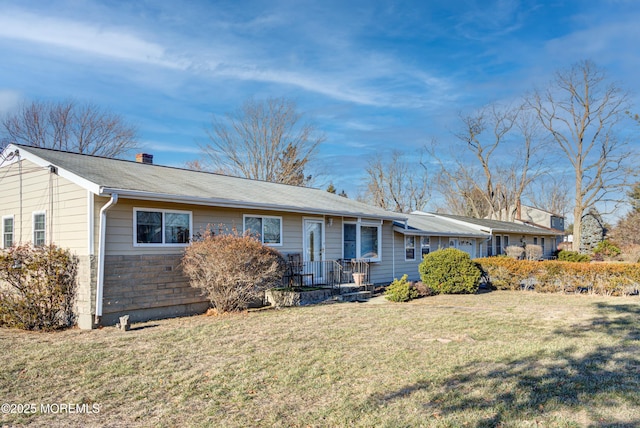 view of front of home with a front lawn