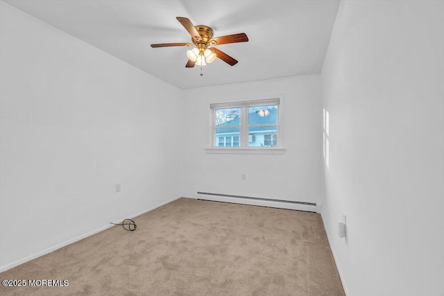 unfurnished room with ceiling fan, light carpet, and a baseboard heating unit