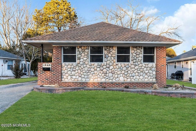 view of home's exterior featuring a lawn