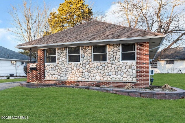 view of home's exterior with a yard