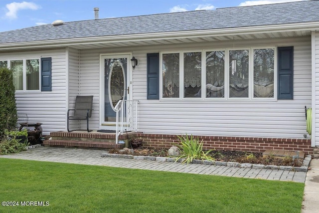 view of front of home with a front yard