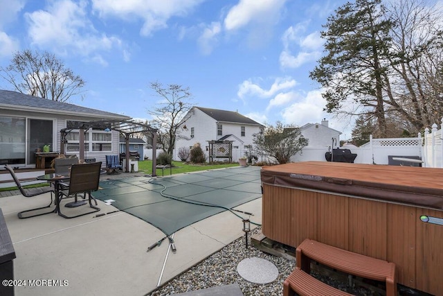 view of pool with a patio area, a hot tub, and a pergola