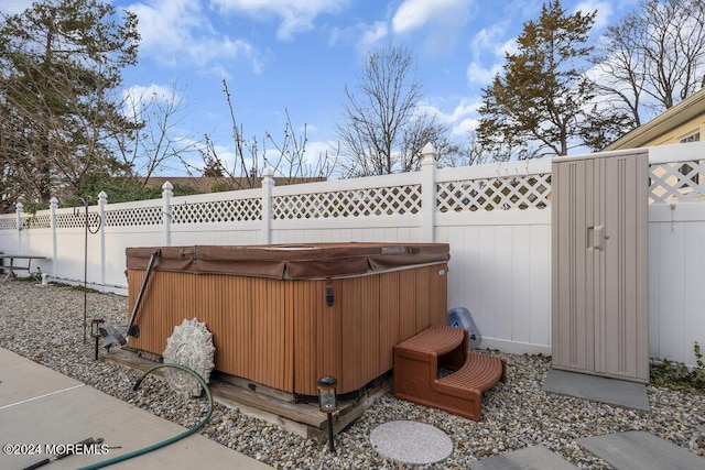 view of patio / terrace featuring a hot tub