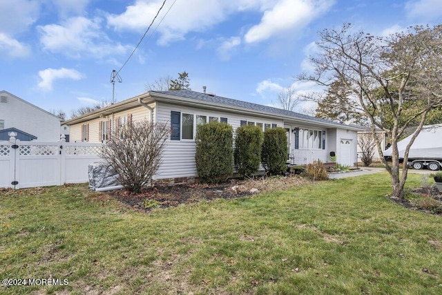 view of front of home with a front yard