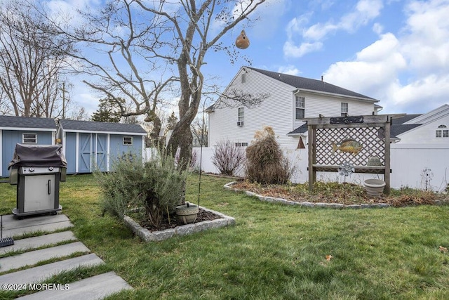 view of yard with a storage shed