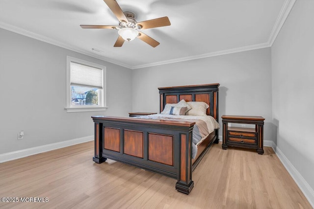 bedroom featuring ceiling fan, crown molding, and light hardwood / wood-style flooring