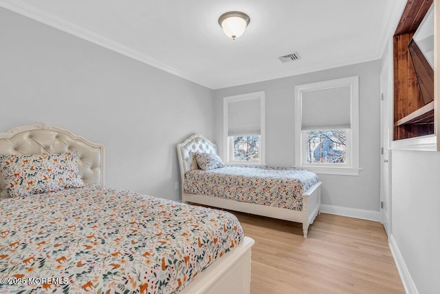 bedroom featuring light wood-type flooring