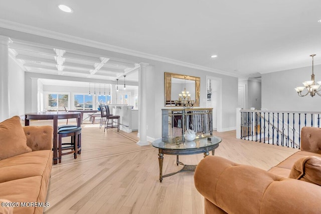 living room featuring a notable chandelier, beamed ceiling, coffered ceiling, light wood-type flooring, and ornamental molding