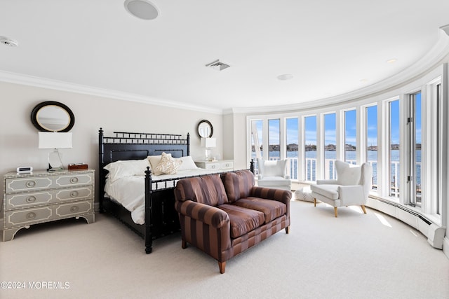 bedroom featuring ornamental molding, a baseboard radiator, and carpet