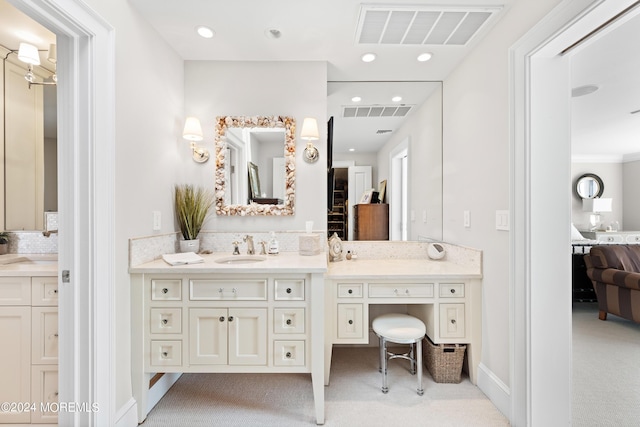 bathroom with vanity and decorative backsplash