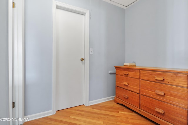 bedroom with light hardwood / wood-style flooring