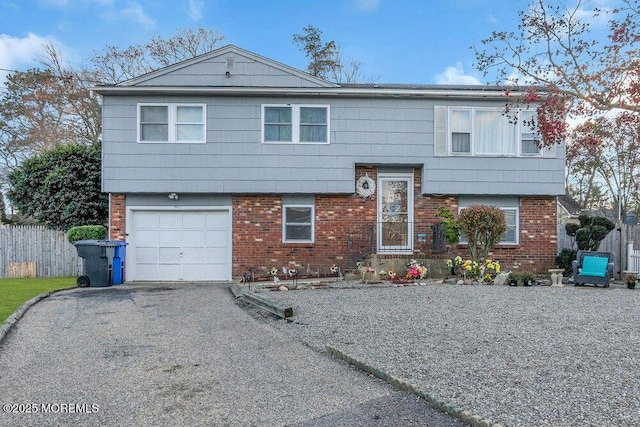 raised ranch featuring a garage