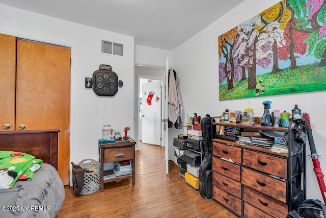 bedroom featuring light hardwood / wood-style flooring