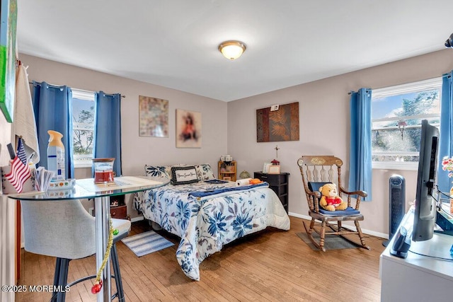 bedroom featuring light wood-type flooring