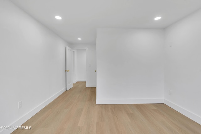 empty room with light wood-type flooring