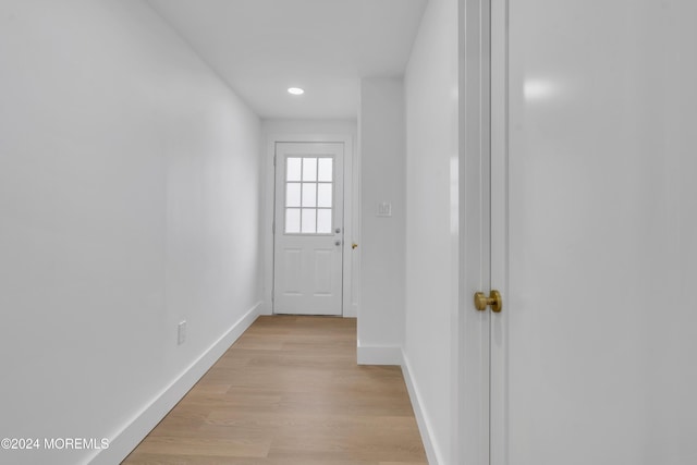 doorway to outside featuring light hardwood / wood-style flooring