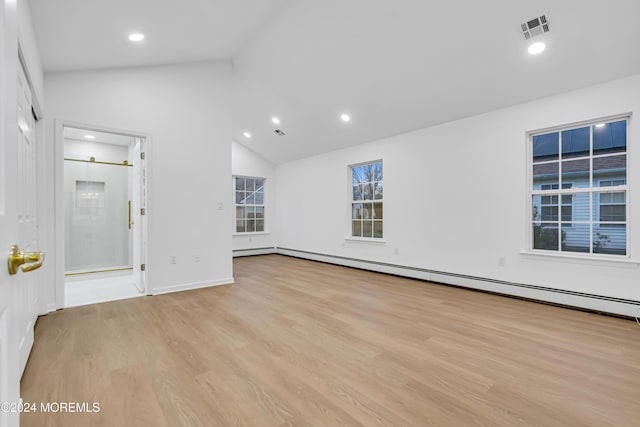 interior space featuring high vaulted ceiling and light hardwood / wood-style flooring