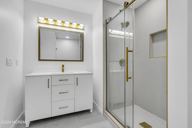 bathroom with an enclosed shower and vanity