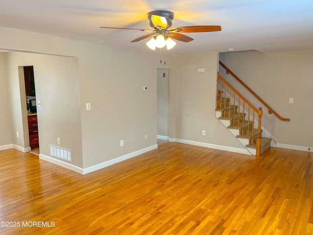 169 Docare Rd, Jackson, NJ 08527 - spare room featuring a ceiling fan, light wood-style floors, stairs, and baseboards