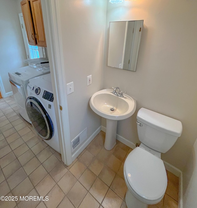 169 Docare Rd, Jackson, NJ 08527 - bathroom with washer / clothes dryer, toilet, baseboards, and tile patterned floors