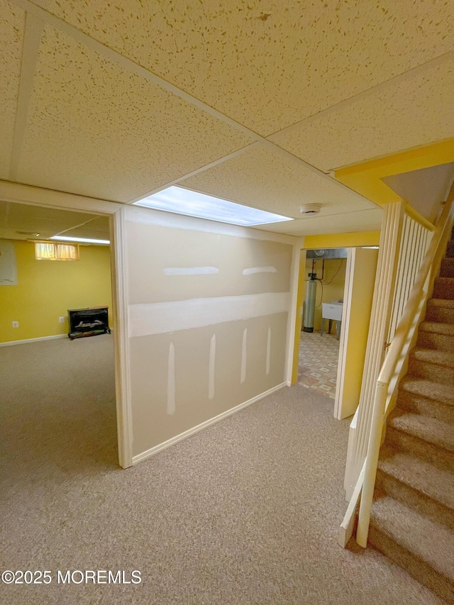 169 Docare Rd, Jackson, NJ 08527 - basement with carpet, stairs, a sink, and baseboards