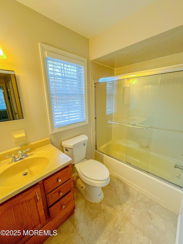 169 Docare Rd, Jackson, NJ 08527 - full bathroom with toilet, vanity, combined bath / shower with glass door, and tile patterned flooring