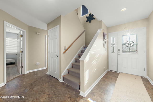 foyer entrance with a healthy amount of sunlight