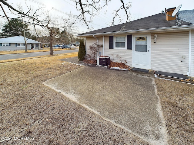 exterior space featuring a patio area and central AC unit