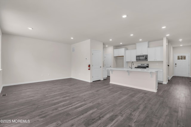 interior space with sink and dark hardwood / wood-style flooring