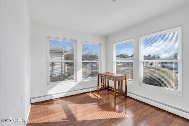 sunroom featuring baseboard heating