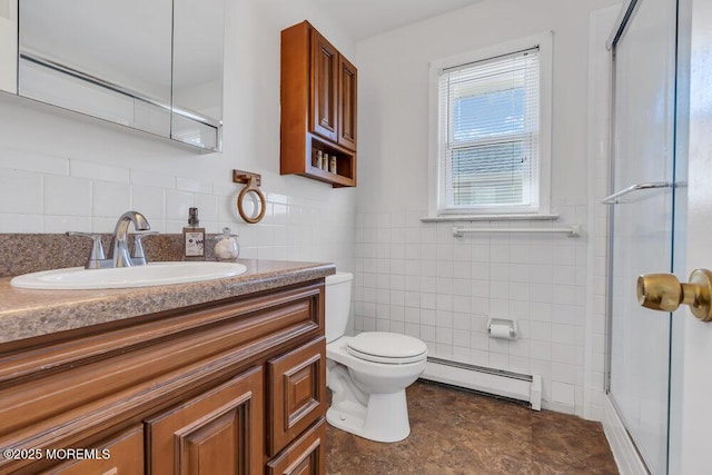 bathroom featuring toilet, a shower with shower door, tile walls, a baseboard radiator, and vanity