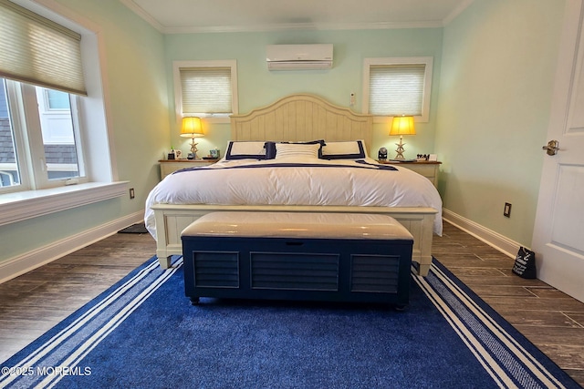 bedroom featuring dark wood-type flooring, crown molding, and a wall mounted AC