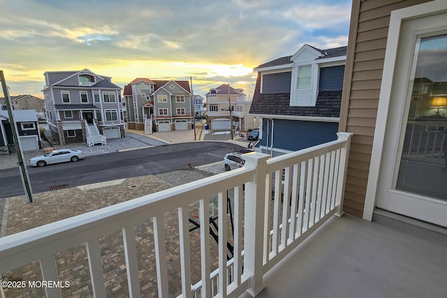 view of balcony at dusk