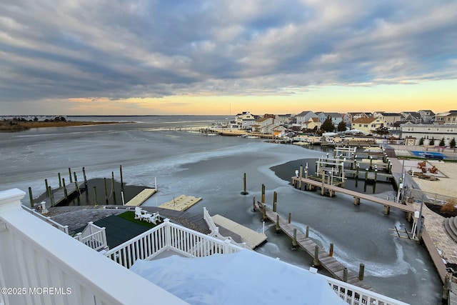 property view of water featuring a boat dock